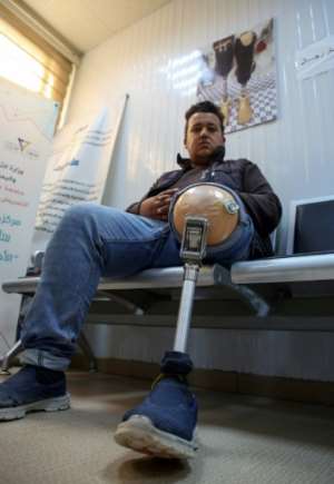 A patient waits for a consultation. By Mahmud TURKIA (AFP)