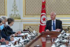 A picture provided by the Tunisian Presidency on October 14, 2021 shows President Kais Saied chairing the first meeting of a new cabinet in Tunis following his July power grab. By - (TUNISIAN PRESIDENCY/AFP/File)