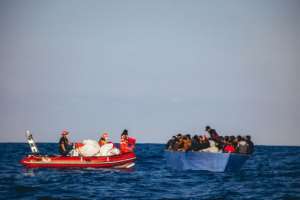A picture released by German migrant rescue NGO Sea-Eye shows an operation to rescue people in distress off the Libyan coast in April. By Cedric FETTOUCHE (sea-eye.org/AFP)