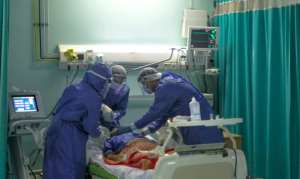 A picture taken by a doctor at a Cairo hospital on April 29 shows medical staff intubating a coronavirus patient. By YAHYA DIWER (AFP/File)