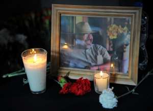 A portrait of slain Mexican journalist Javier Valdez is displayed during a tribute organized by colleagues, relatives and civil organizations in Mexico City on July 15, 2017.  By Bernardo Montoya (AFP/File)