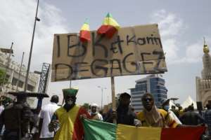 A protest placard at a rally in Bamako on June 5 reads: