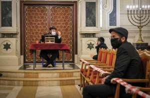 A rabbi gives a sermon at the synagogue of Beth El in the Moroccan city of Casablanca on January 5, 2021. By FADEL SENNA (AFP/File)