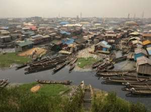 A recession will likely hurt even more of Nigeria's poor. By FLORIAN PLAUCHEUR (AFP/File)