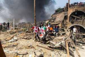 A Red Cross official said they were still recovering bodies from the scene. By Benson IBEABUCHI (AFP)