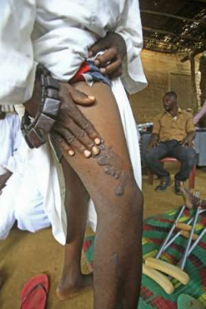A Sudanese resident pictured last year in a displaced people's camp in Darfur, where ethnic African rebels took up arms, alleging racial discrimination. Khartoum then unleashed the Janjaweed, a militia of mostly Arab raiding nomads, on them. By ASHRAF SHAZLY (AFP/File)