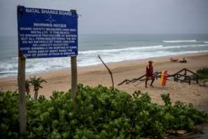 A shark warning notice board at Umgababa Beach near Durban. By Michele Spatari (AFP)