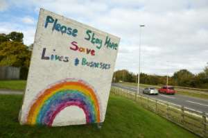 A sign outside a pub in Wales asks people to do their bit and