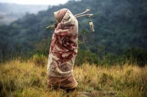 A teenage boy takes a walk in the bush during the traditional Xhosa initiation into manhood. Circumcision is a key part of the ritual.. By MUJAHID SAFODIEN (AFP/File)
