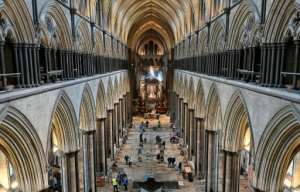 A temporary vaccination centre has been set up inside Salisbury Cathedral in southwest England, with musicians playing the 19th-century organ to soothe the nerves of those waiting for their shots. By JUSTIN TALLIS (AFP)