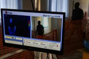 A thermal scanner at Mpondwe is used to screen travellers for high temperature, an early sign of Ebola. By ISAAC KASAMANI (AFP)