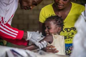 A toddler gets a measles vaccination in western DR Congo last month but further north in Chad the vaccination programme has been hit by the COVID-19 pandemic. By JUNIOR KANNAH (AFP)