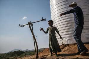 A water tap at the Chagni camp. By EDUARDO SOTERAS (AFP)