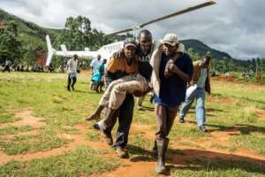 A wounded survivor is evacuated by helicopter from Chimanimani, in eastern Zimbabwe. By ZINYANGE AUNTONY (AFP)