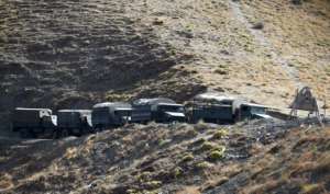 A 2014 file photo shows Algerian army troops carrying out search operations in the mountainous eastern Tizi Ouzou region to find a French hiker who was kidnapped by militants linked to the Islamic State group. By Farouk Batiche (AFP/File)