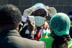 'Act in the national interest', Emmerson Mnangagwa tells health workers. By Jekesai NJIKIZANA (AFP)