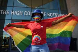 Activists outside the Botswana High Court on October 12. The southern African country's government is appealing against a landmark ruling that decriminalises same-sex relationships. By Monirul Bhuiyan (AFP)