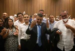 Abdellatif Ouahbi, president of Morocco's Authenticity and Modernity party (C), gestures after his party came in second in the election, with 82 seats. By FADEL SENNA (AFP)