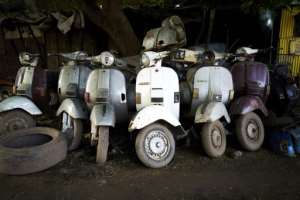 Ageing beauties: Several hundred classic Vespas, most of them made in the 1970s, still cruise the streets of Bamako. By MICHELE CATTANI (AFP)