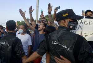 After President Kais Saied announched his month-long 'state of exception' supporters also came out to show their approval. By FETHI BELAID (AFP)