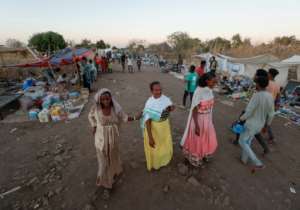 Ahead of Christmas, food prices soared in the Um Raquba refugee camp, packed with some of the nearly 60,000 Ethiopians who have crossed into Sudan. By ASHRAF SHAZLY (AFP)