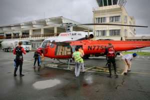 Air rescue: Helicopters are often the only way to reach stranded people -- but there is a shortage of the craft, say emergency teams. By ADRIEN BARBIER (AFP)