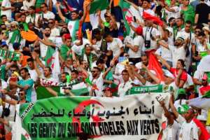Algeria supporters cheer ahead of the 2019 Africa Cup of Nations (CAN) final football match between Senegal and Algeria at the Cairo International Stadium on July 19, 2019.  By Giuseppe CACACE (AFP)