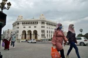 Algerian women walk past the main post office in Algiers on August 12, 2020. One well-known TV presenter has criticised a culture of street harassment against women in the North African country. By RYAD KRAMDI (AFP/File)