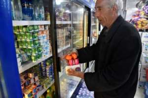 Algeria's lower house of parliament passed a bill on November 17 that paves the way to scrapping subsidies on basic goods, replacing it with targeted aid. By Ryad KRAMDI (AFP)