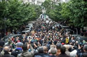 Algeria's powerful army chief General Ahmed Gaid Salah -- who died Monday -- asked president Abdelaziz Bouteflika to resign in April in the fact of an unprecedented protest movement. By RYAD KRAMDI (AFP)