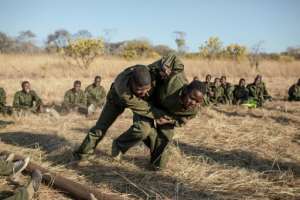 All Akashinga rangers come from villages near the area they patrol, so they can work with the locals. By GIANLUIGI GUERCIA (AFP)