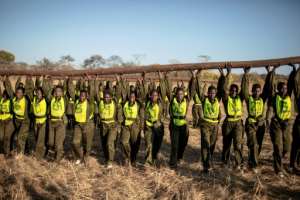 All the Akashinga rangers have overcome adversity in their past, having survived abuse or great hardship. By GIANLUIGI GUERCIA (AFP)