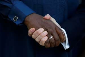 Allies: French President Emmanuel Macron shakes hands with Deby during a Sahel summit in Pau, southern France, in January 2020. By REGIS DUVIGNAU (POOL / AFP)