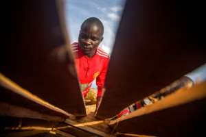 Although coffins have proven to be their biggest seller, the teachers have also taken on other carpentry jobs. By Badru KATUMBA (AFP)