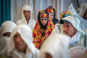 Among those waiting to wed, some looked nervous, while other couples exchanged excited glances. By FADEL SENNA (AFP)