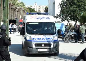 Ambulance evacuates victims of the gun attack on the Tunisian capital's Bardo Museum in March 2015.  By FETHI BELAID (AFP)
