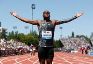 American Christian Coleman poses for photographers after winning the Men's 100m at the Prefontaine Classic Diamond League meeting. By Lachlan Cunningham (GETTY IMAGES NORTH AMERICA/AFP)