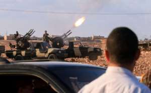 An anti-aircraft gun fires during the funeral of a commander of the self-proclaimed Libyan National Army loyal to strongman Khalifa Haftar, in the eastern city of Benghazi on November 1. By Abdullah DOMA (AFP/File)