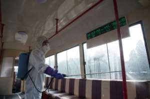 An official from the Mangyongdae District emergency anti-epidemic headquarters disinfects a tramcar to prevent the spread of the COVID-19 coronavirus in Pyongyang, North Korea. By KIM Won Jin (AFP)