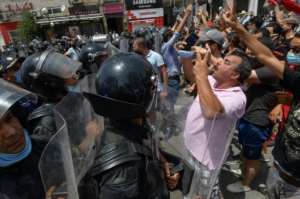 Anti-government demonstrators have also clashed with security forces since the political crisis erupted. By FETHI BELAID (AFP)