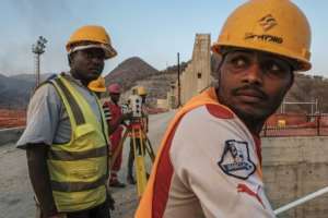 As workers toil to finish the project, Ethiopian negotiators remain locked in talks over how the dam will affect downstream neighbours, principally Egypt. By EDUARDO SOTERAS (AFP)