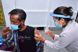 As of Saturday, 61 percent of the population was fully vaccinated. By Rishi ETWAROO (L'Express Maurice/AFP/File)