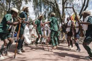 As rifle-toting actors danced around chanting actresses, an audience cheered when the troupe denounced the Tigray People's Liberation Front as a band of 'traitors' . By EDUARDO SOTERAS (AFP)