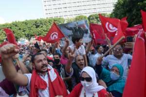 Aside from the rally, pictured, on Bourguiba avenue in Tunis, local media reported smaller-scale pro-Saied demonstrations elsewhere in the country. By Fethi Belaid (AFP)