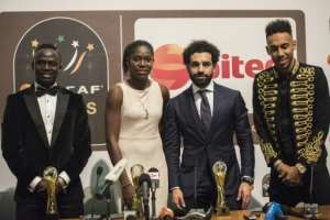 Asisat Oshoala was voted the women's African footballer of the year for a third time in 2017 and shared the stage with the top three in the men's category: winner Mohamed Salah, Sadio Mane and Pierre-Emerick Aubameyang. By CRISTINA ALDEHUELA (AFP/File)