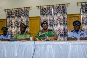 Army chief Constantino Chiwenga (centre, right) on Monday warned of military intervention if the purges continued