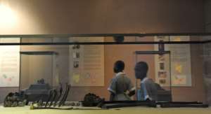 At Kenya's national museum in Nairobi, school children look at the nearly complete skeleton of