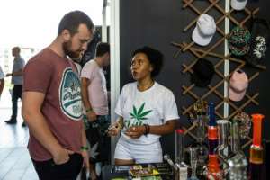 Attendees were treated to a world of cannabis-derived products, from medicinal oils, dog treats and even pure hemp clothing. By Wikus DE WET (AFP)