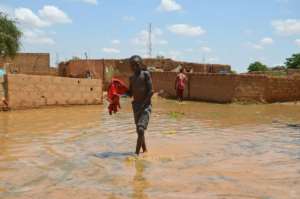Authorities trigged a 'red alert' as water rose to 6.38 metres (21 feet) in Niamey. By BOUREIMA HAMA (AFP)
