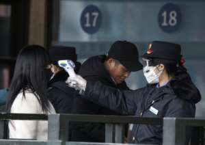 Authorities are conducting temperature checks on people across China as they return to work following the Lunar New Year holiday. By NOEL CELIS (AFP)